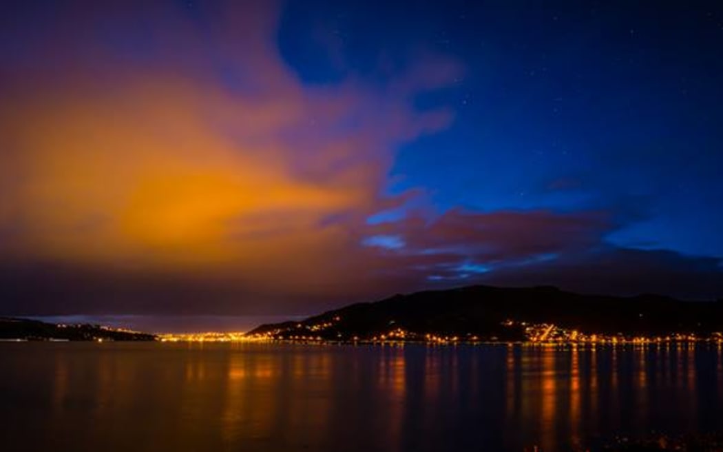 Bright clouds and light reflections on Otago Harbour in Dunedin