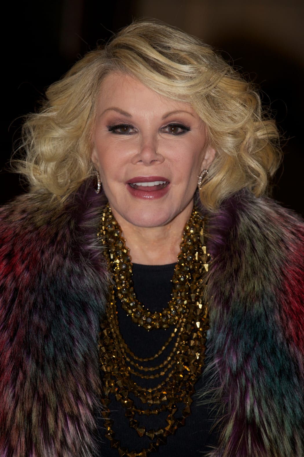 This November 28, 2012 file photo shows US television personality and comedian Joan Rivers on the red carpet as she arrives at the Prince's Trust comedy gala 'We Are Most Amused' at the Royal Albert Hall in London.