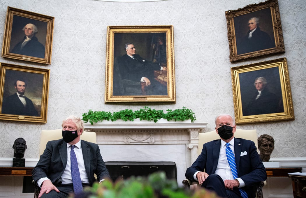 WASHINGTON, DC - SEPTEMBER 21: U.S. President Joe Biden (R) meets with British Prime Minister Boris Johnson (L) in the Oval Office of the White House on September 21, 2021 in Washington, DC.