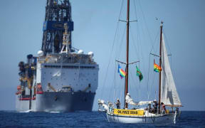 Anadarko's drill ship and a Greenpeace protest boat off Taranaki in November.