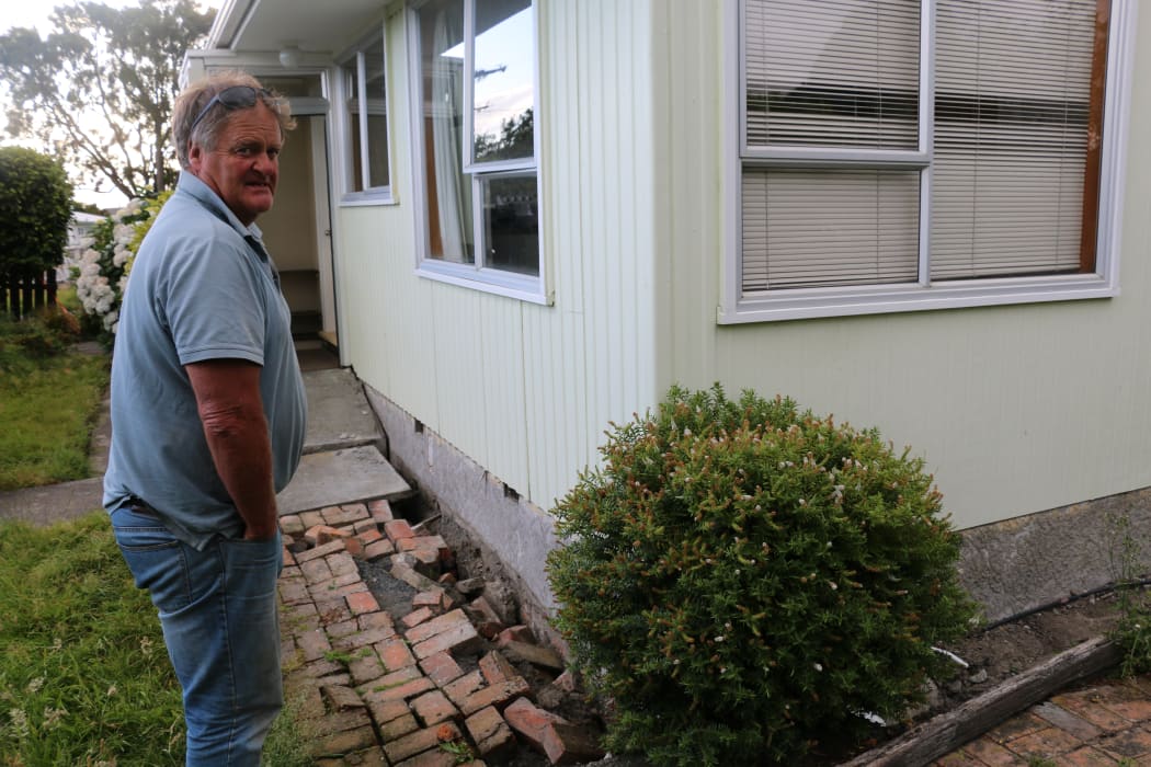 Tony Guthrie at his earthquake-damaged home beside Lyell Creek.