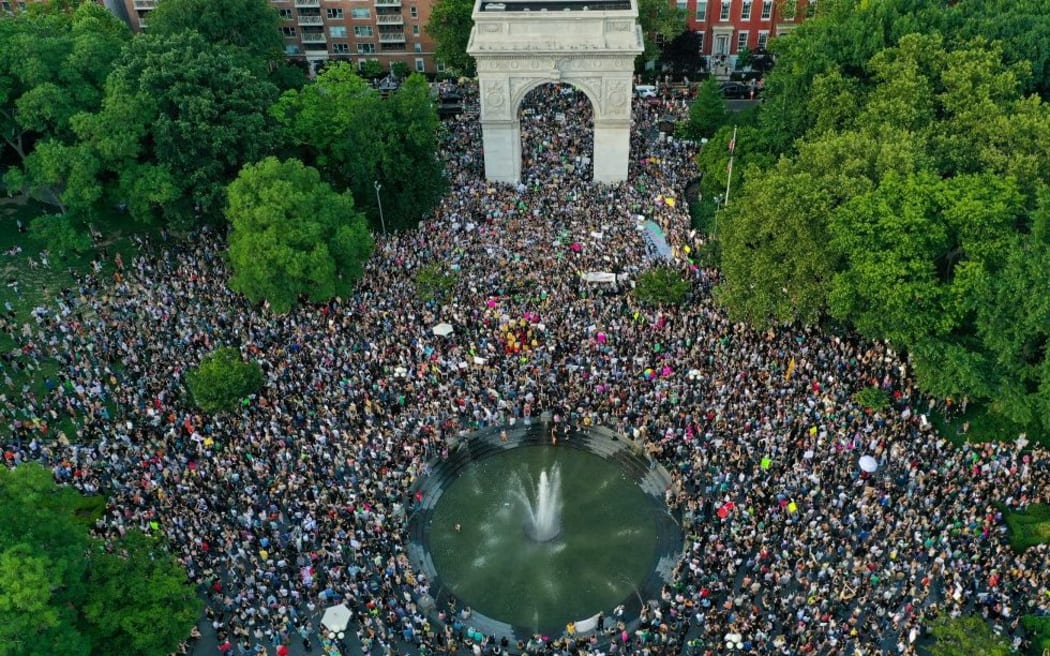 NEW YORK, USA - JUNE 24: An aerial view of people gathered at Washington Square Park to protest against the Supreme Court's decision in the Dobbs v Jackson Women's Health case on June 24, 2022 in the Manhattan borough of New York City, United States. The Court's decision in the Dobbs v Jackson Women's Health case overturns the landmark 50-year-old Roe v Wade case, removing a federal right to an abortion. Tayfun Coskun / Anadolu Agency (Photo by Tayfun Coskun / ANADOLU AGENCY / Anadolu Agency via AFP)