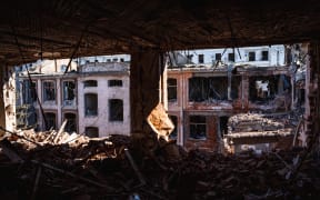 A view from a heavily damaged building after Russian attacks in Kharkiv, Ukraine on March 22, 2022.