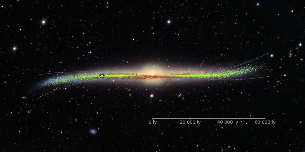 Artist impression of Milky Way galaxy warping and twisting.