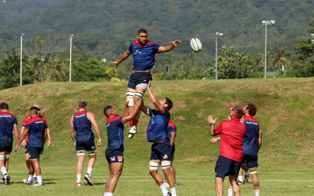 Lukhan Tui is lifted during lineout drills at Reds training in Apia.