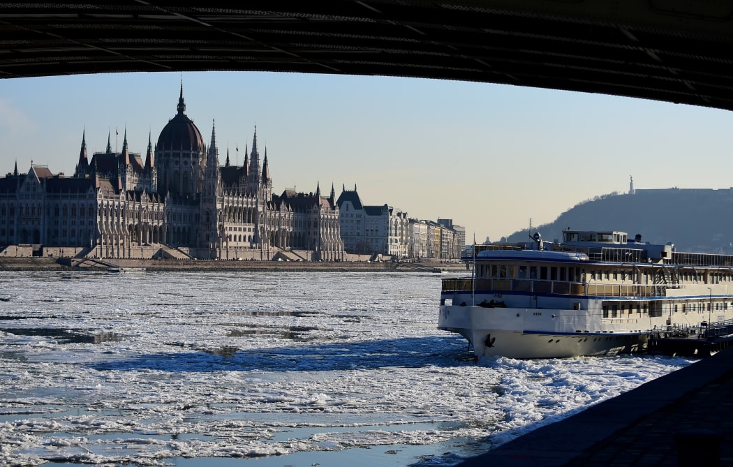 Ice floats in the water of the River Danube in Budapest on 8 January 2017, when extreme winter temperature set a new record in the capital with -18.6°C.