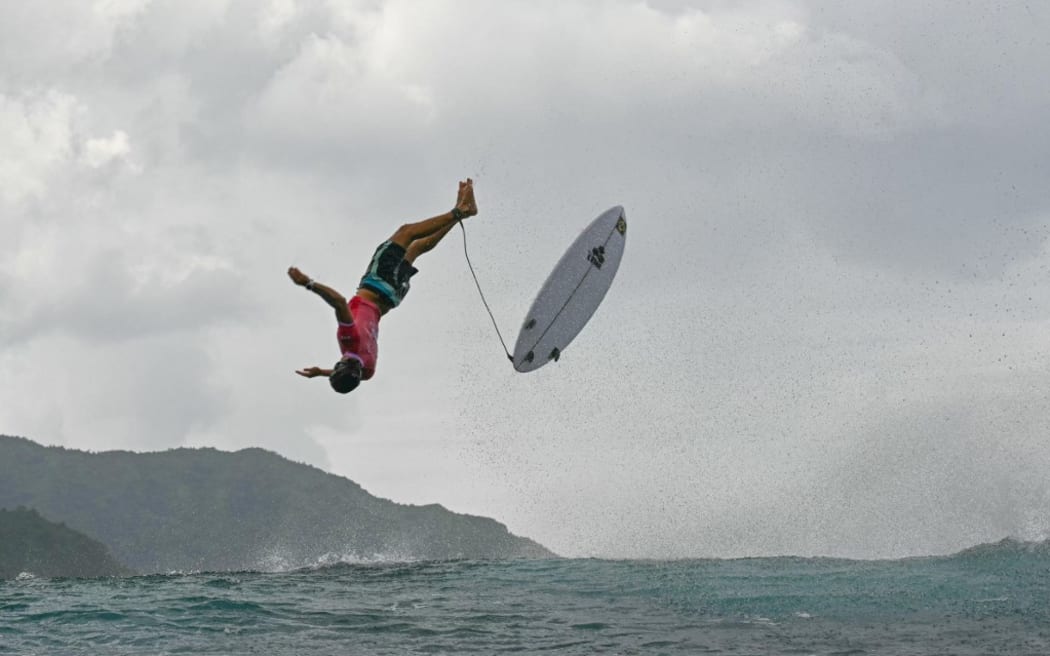 Brazil's Joao Chianca comes off a wave in the 6th heat of the men's surfing round 3, during the Paris 2024 Olympic Games, in Teahupo'o, on the French Polynesian Island of Tahiti, on July 29, 2024.