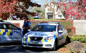 Police at the Coatesville property where two people were found deceased after a fire.