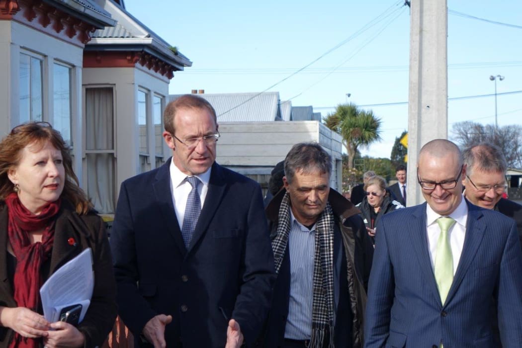 Andrew Little takes a tour around South Dunedin with Labour MP Clare Curran, left, Dunedin Mayor Dave Cull and Labour MP David Clark.