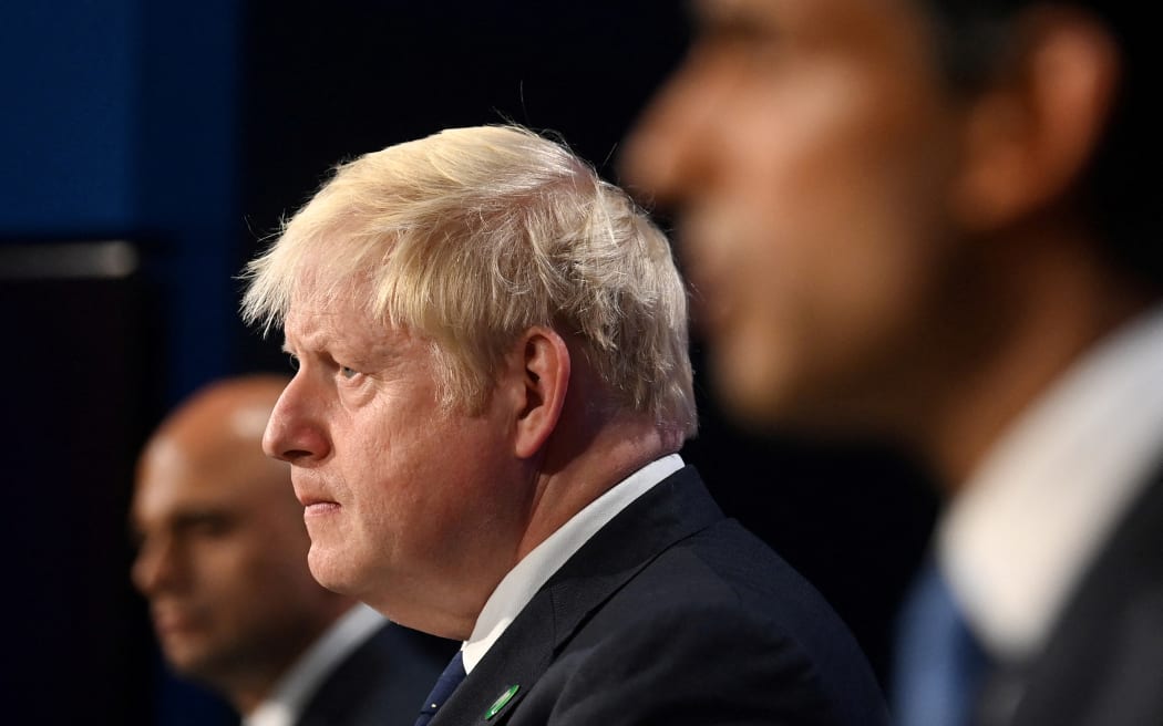 (File photo) Britain's Prime Minister Boris Johnson, centre, Health Secretary Sajid Javid, left, and Chancellor of the Exchequer Rishi Sunak attend a press conference inside the Downing Street Briefing Room on 7 September 2021.