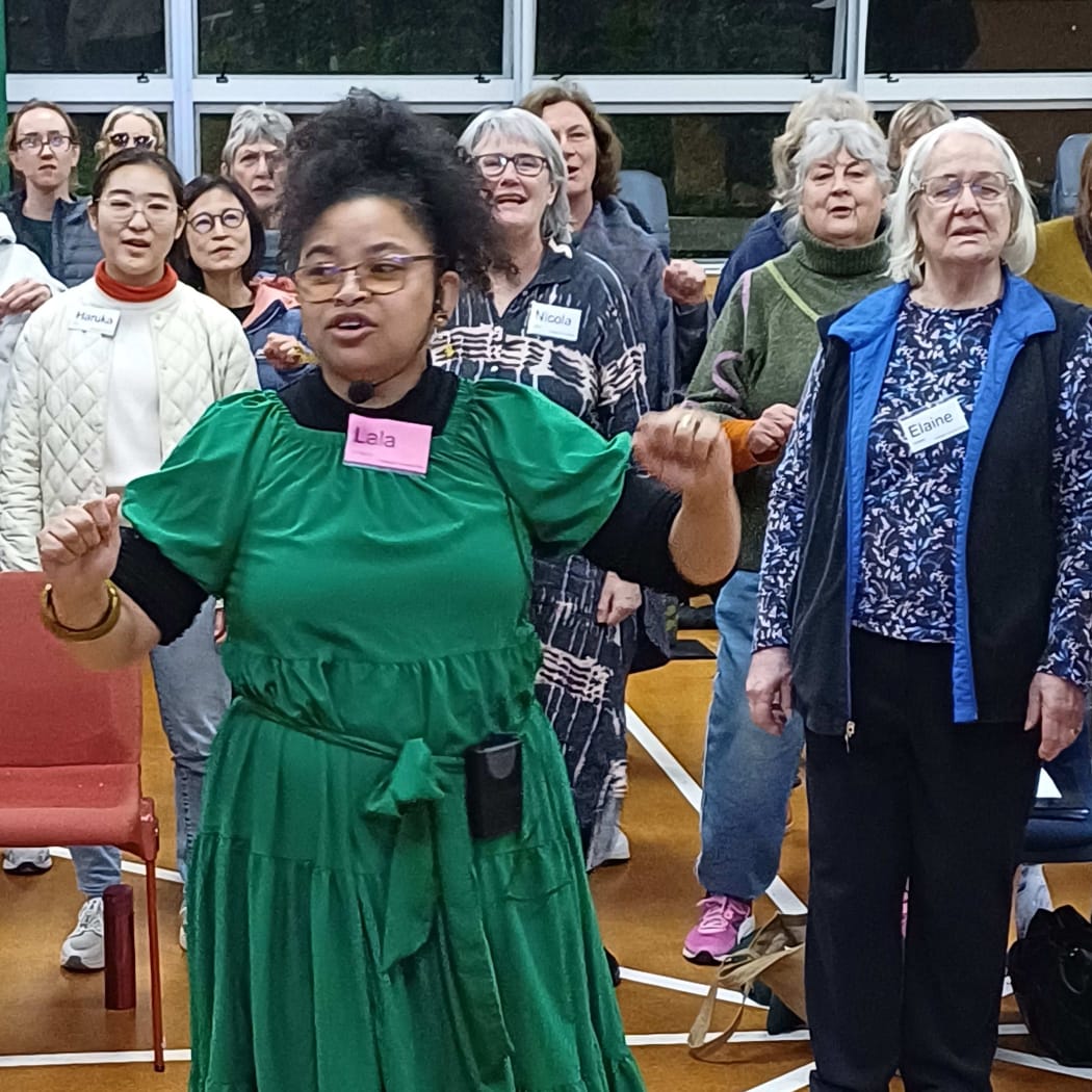 Lala Simpson leading the Wellington Community Choir