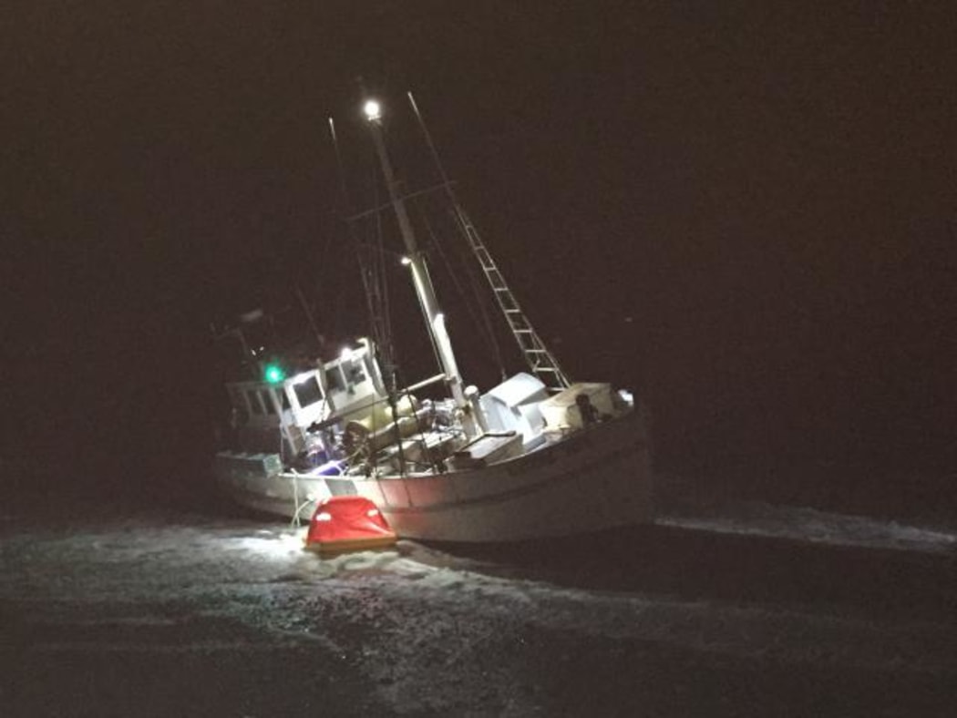 Fishing boat aground at Cobden Beach