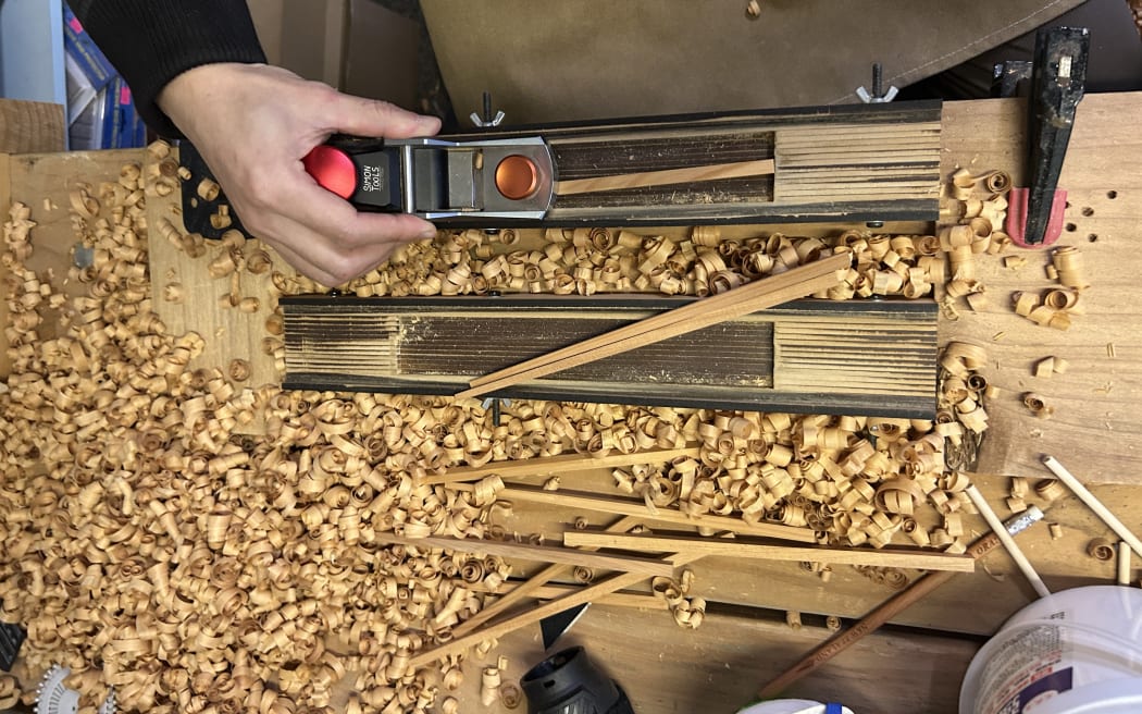 Picture shows two planers and a handmade mold. With a pair of roughly shaped chopsticks sitting on top.
