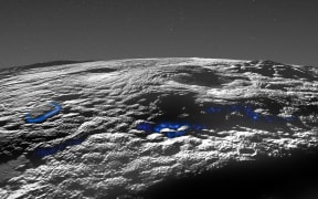 This image released by NASA/Johns Hopkins University Applied Physics Laboratory/Southwest Research Institute on 29 March 2022, shows a perspective view of Pluto's icy volcanic region.