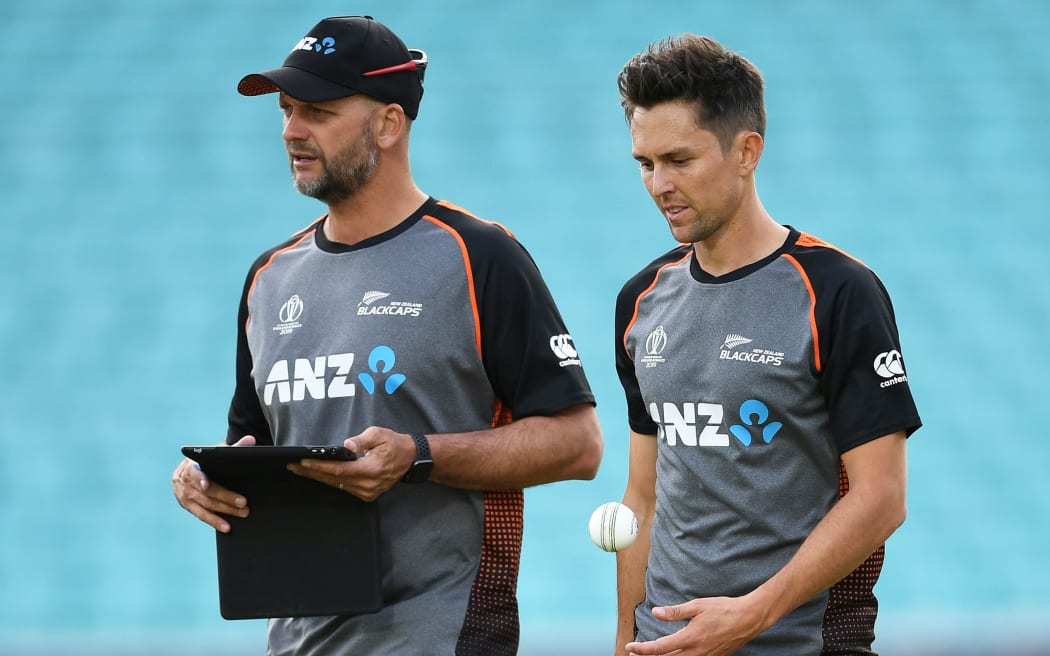Black Caps bowling coach Shane Jurgensen works with Trent Boult.