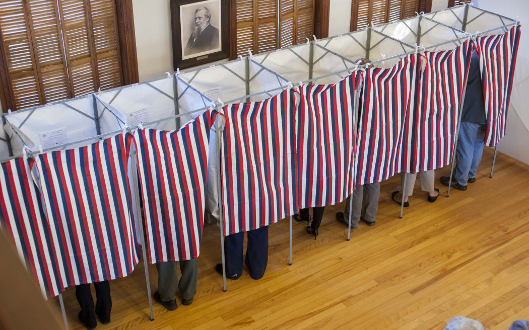 Voters cast their ballots in US election.