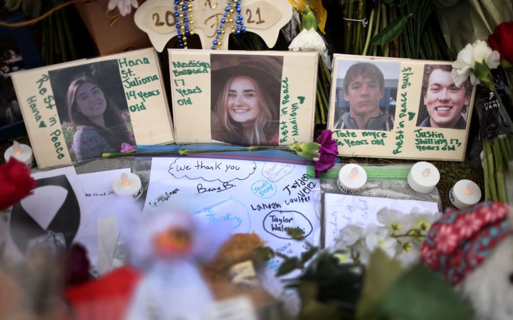A memorial outside of Oxford High School continues to grow on December 03 2021 in Oxford, Michigan. Four students were killed and seven others injured on November 30,