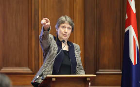 Helen Clark indicates where they created a partitioned area for women MPs amongst the men's billiard tables