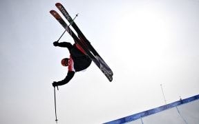 New Zealand's Nico Porteous practices before the start of the freestyle skiing men's freeski halfpipe qualification run during the Beijing 2022 Winter Olympic Games on February 17, 2022.