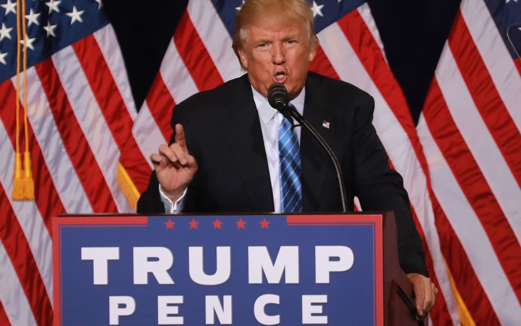 Republican presidential nominee Donald Trump unveils his 10-point plan to crack down on illegal immigration during a campaigm event inside the Phoenix Convention Center on August 31, 2016 in Phoenix, Arizona.