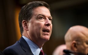 FBI Director James Comey testifies during a US House of Representatives Intelligence Committee hearing.