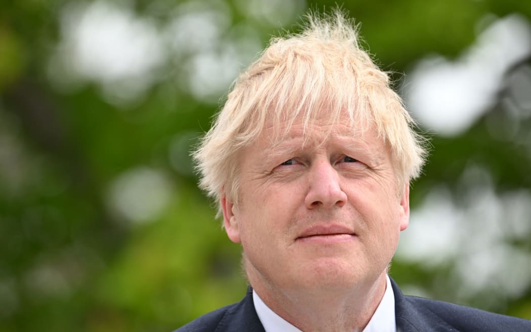 British Prime Minister Boris Johnson addresses a press conference with Sweden's Prime Minister after talks at the retreat residence of the Swedish Prime Minister in Harpsund 120km west of Stockholm, Sweden on May 11, 2022. - British Prime Minister Johnson and his Swedish counterpart Andersson on May 11, 2022 announced a mutual defence agreement in case of an attack, as Sweden considers whether to join NATO. (Photo by Jonathan NACKSTRAND / AFP)