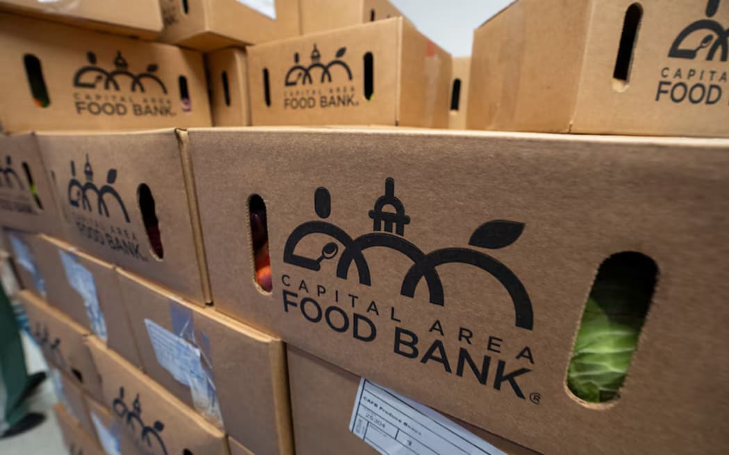 Boxes of food are stacked high at a food bank in Maryland. (ABC News: Bradley McLennan)