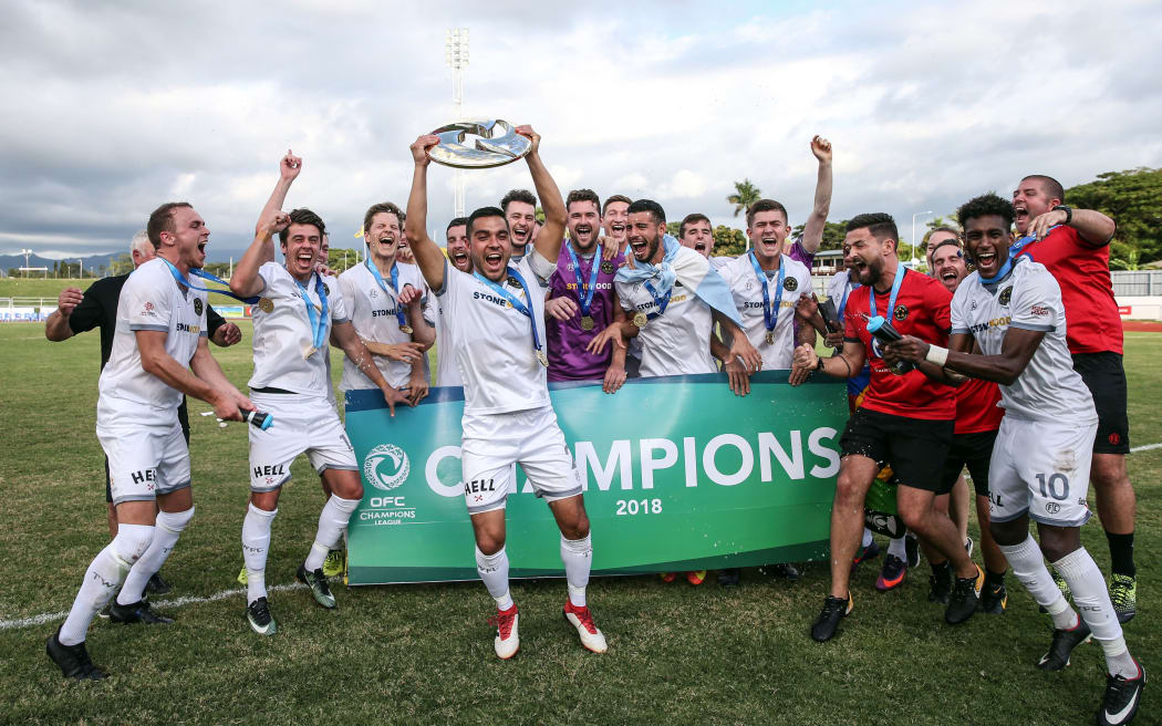 Team Wellington celebrate winning the Champions League
