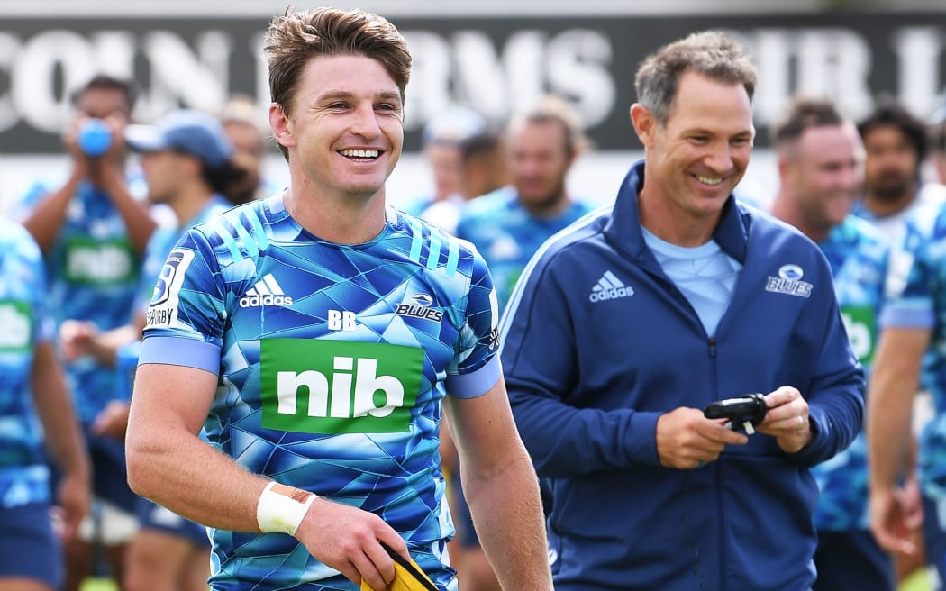 Beauden Barrett shares a laugh with Blues coach Leon MacDonald.