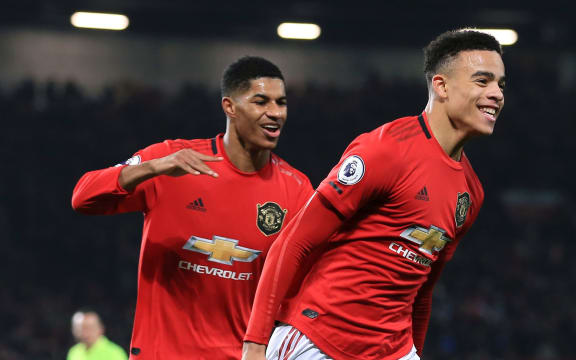 Mason Greenwood of Man Utd celebrates with teammate Marcus Rashford.