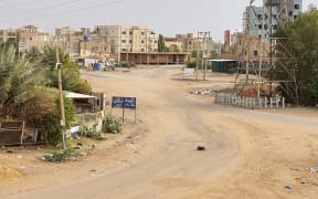 This image shows a deserted street in Khartoum as fighting continues between Sudan's army and the paramilitary forces. - The Sudanese army pounded paramilitaries in the capital with air strikes on April 27, while deadly fighting flared in Darfur, with a US-brokered ceasefire in tatters in its final hours. (Photo by AFP)