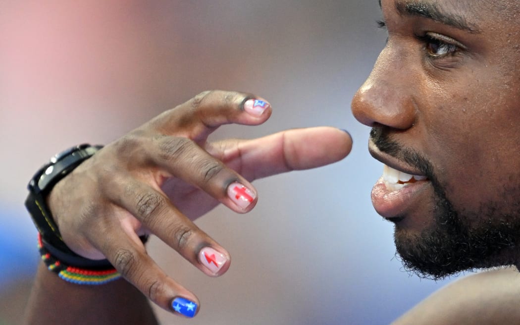 US' Noah Lyles reacts as he prepares to compete in the men's 100m semi-final of the athletics event at the Paris 2024 Olympic Games.