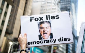 Activists with Extinction Rebellion New York City coordinated a die-in in front of Fox News to call attention to misinformation spread by the broadcast news company surrounding the climate crisis.