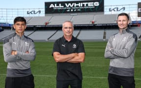 All Whites players Logan Rogerson and Tommy Smith and head coach Darren Bazeley.