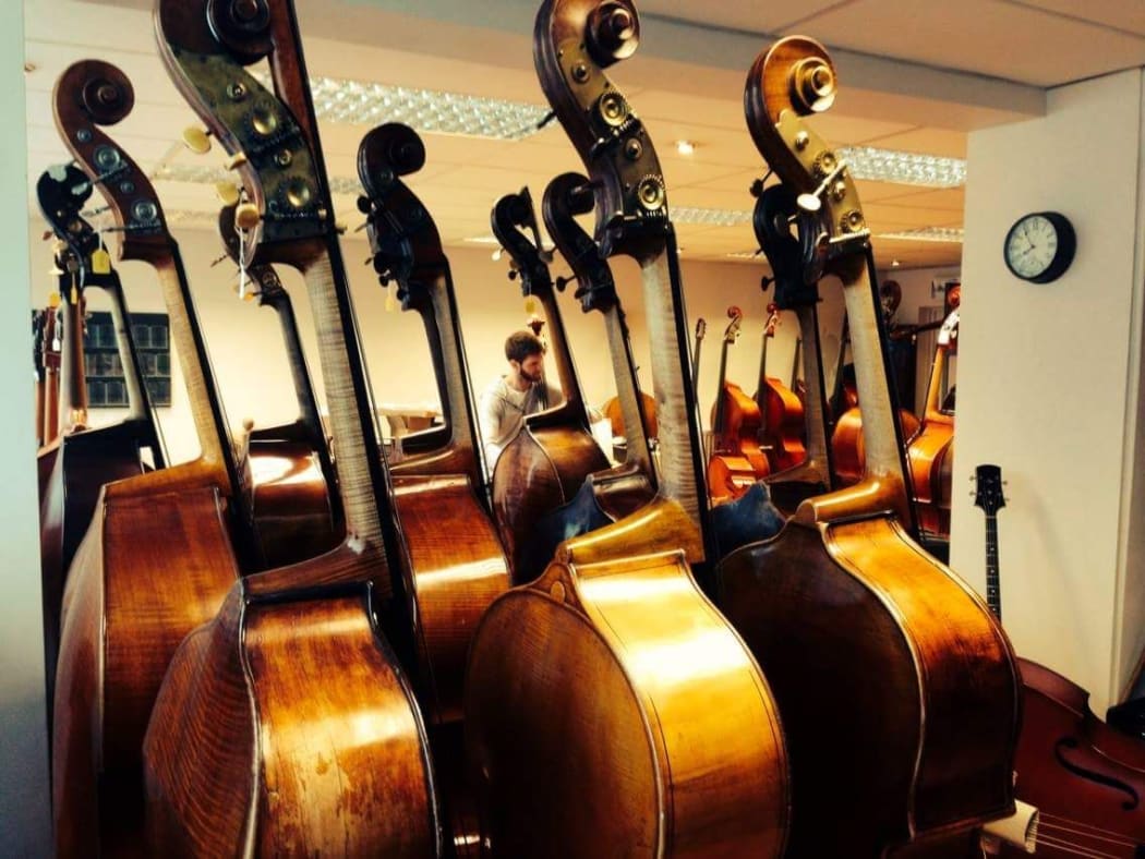 2016 Patricia Pratt Scholarship winner Alex Verster choosing a bass for his music school audition at Thwaites Fine Stringed Instruments in London