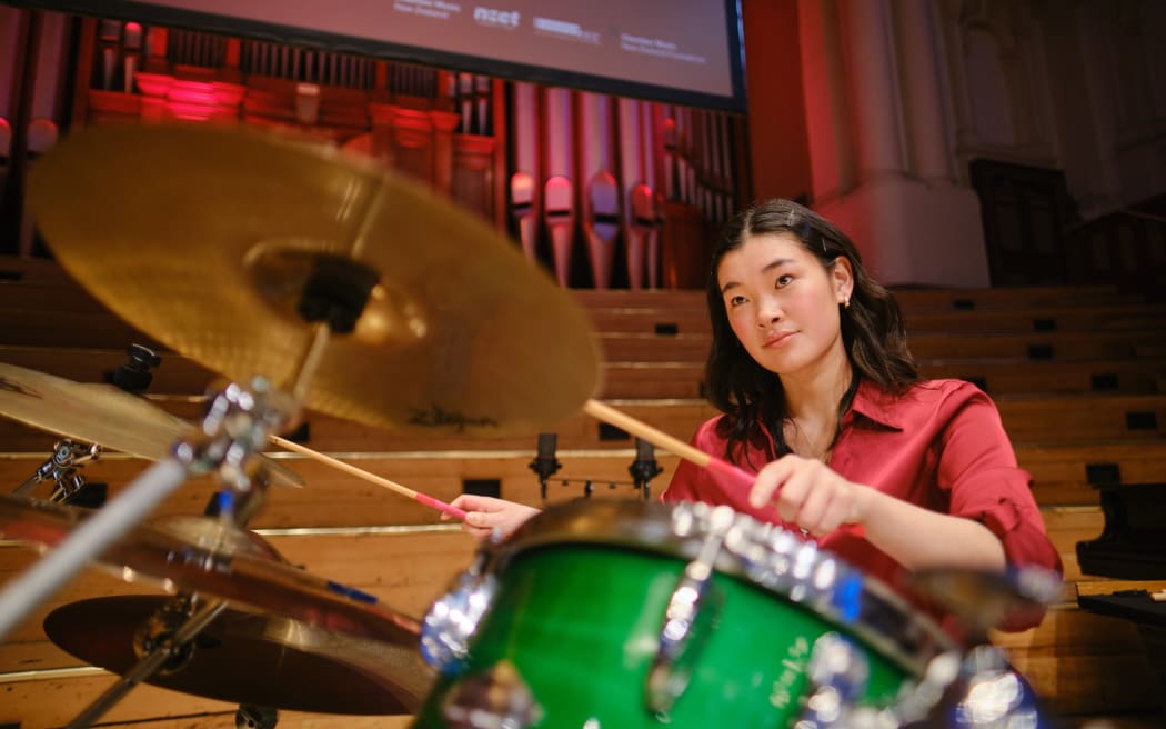 Millie Liu on the drum kit for The Betwieners, Joan Kerr National Third Place Award
