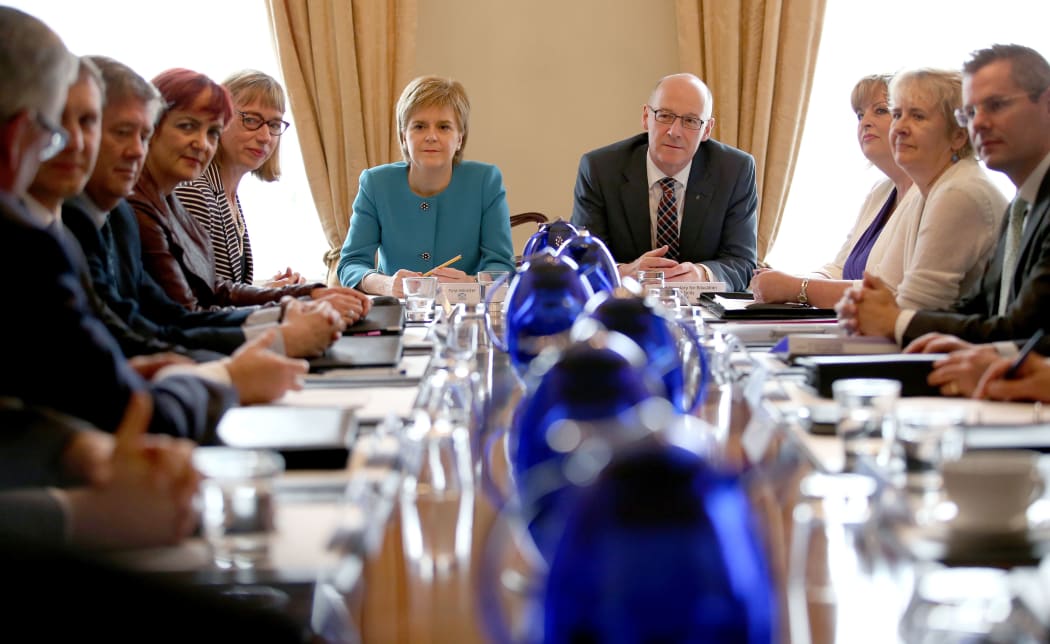 Scotland's First Minister and Leader of the Scottish National Party (SNP), Nicola Sturgeon (6L), chairs an emergency Cabinet meeting at Bute House in Edinburgh, Scotland on June 25, 2016,