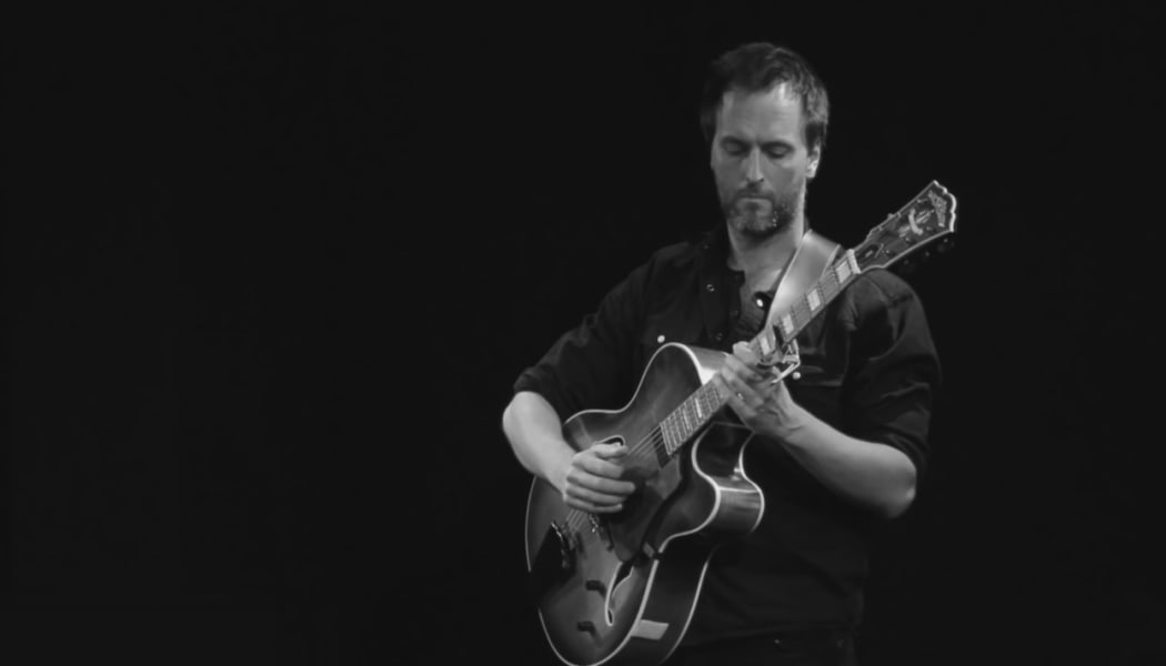 screenshot from John Boden's "I Want to Dance with Somebody" video