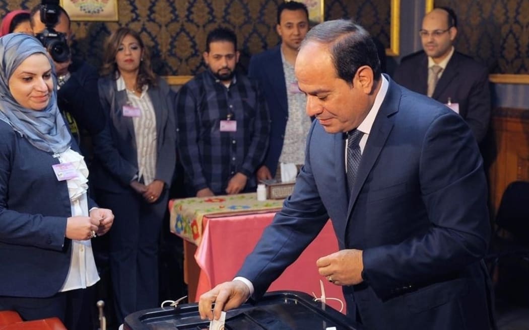 Egyptian President Abdel Fattah al-Sisi casts his ballot during the Egypt’s presidential election.