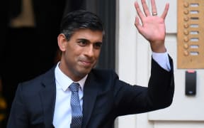 New Conservative Party leader and incoming prime minister Rishi Sunak waves as he leaves from Conservative Party Headquarters in central London having been announced as the winner of the Conservative Party leadership contest, on 24 October 2022.