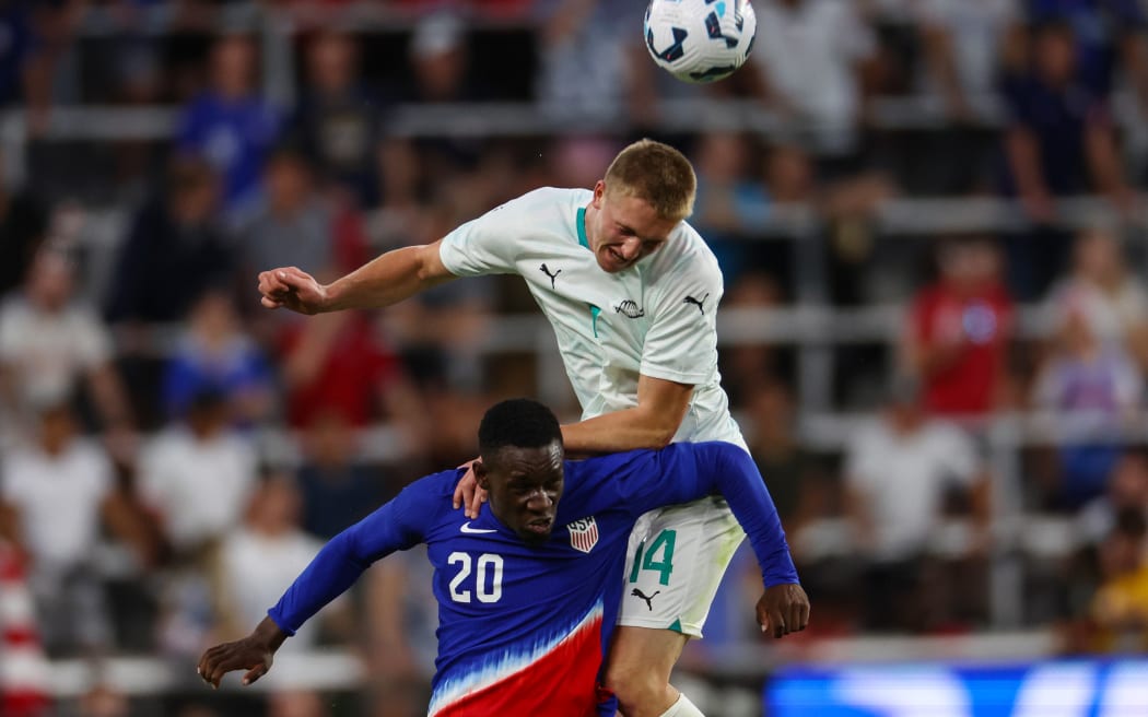 Folarian Balogun of USA and Finn Surman of New Zealand.