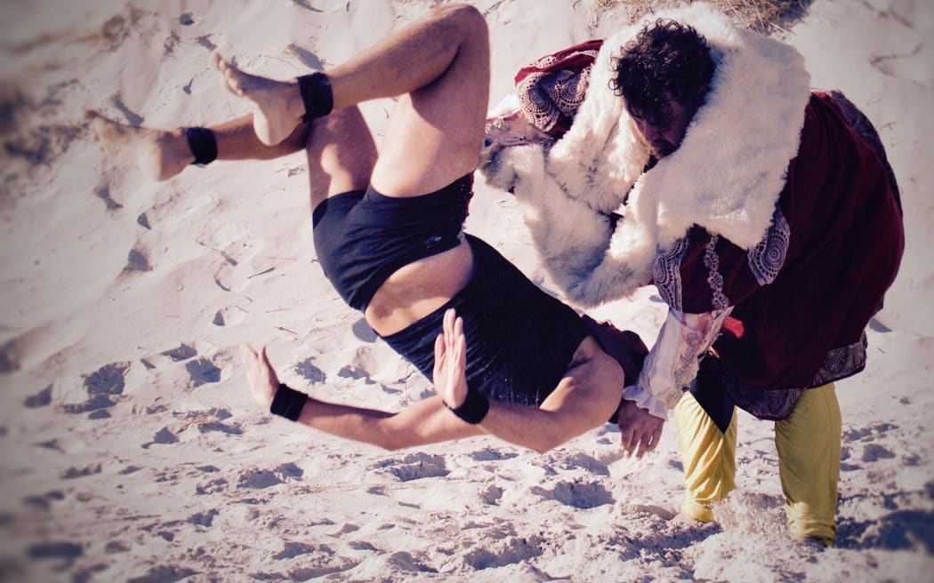 Wilbur McDougall, aka Wilba Force, shows what a body slam looks like.
