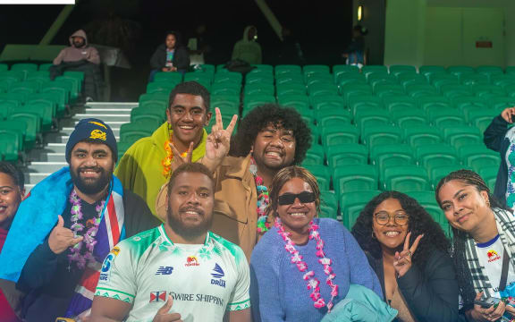 Fijian Drua's Tevita Ikanivere with fans in Perth on Saturday night, following the team's loss to the Western Force. Photo: Fijian Drua