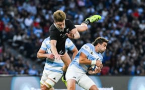 Jordie Barrett competes for the ball.
