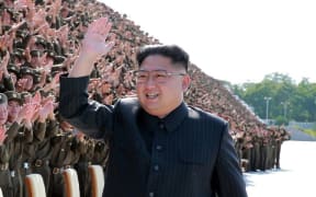 An undated picture released by North Korea's news agency shows leader Kim Jong-Un attending a photo session.