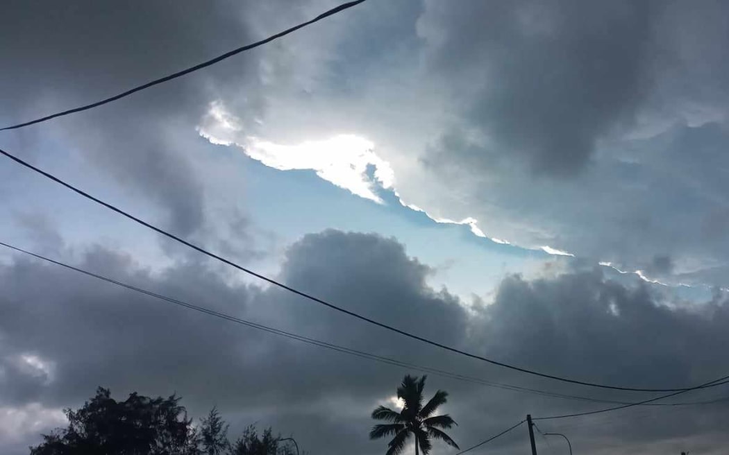 Volcanic clouds cover the skies over Tongatapu at around 5pm on 15 January 2022, as the Hunga Tonga - Hunga Ha'apai volcano started erupting.