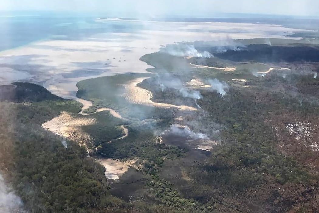 Fire evacuation points on Fraser Island were underwater due to high tides and huge waves, a week after blazes ravaged the island.
