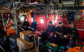 Prime Minister Jacinda Ardern (second right) almost made it to Scott Base on Tuesday after boarding an RNZAF C130 bound for Antarctica. Unfortunately two hour into the journey the plane returned to Christchurch due to bad weather at Scott Base. 
Photograph by Mike Scott