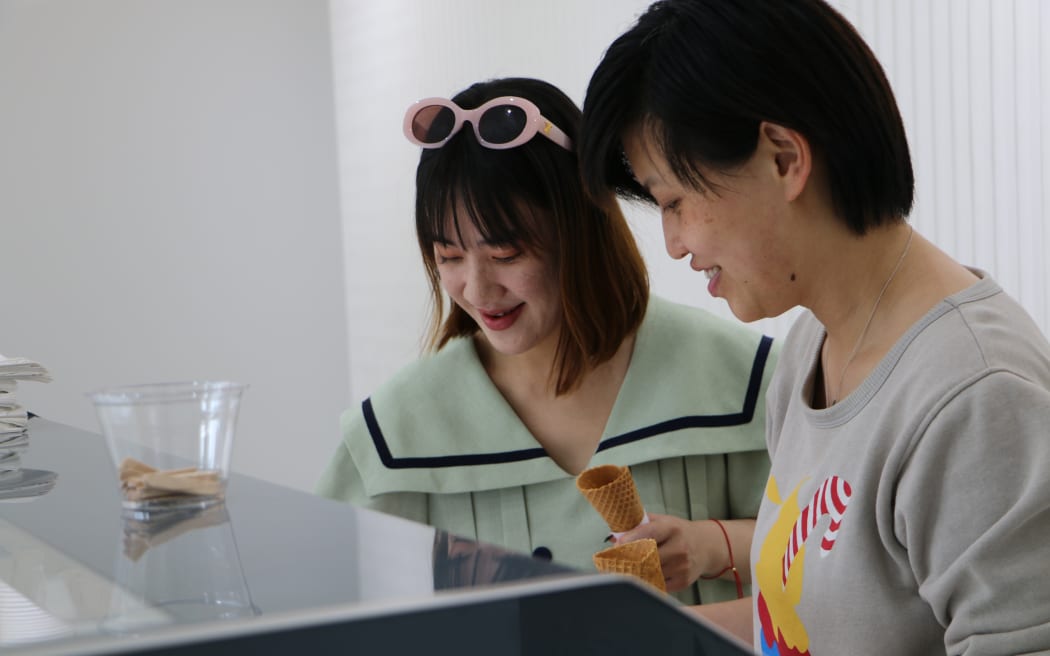 Fugitoto co-owners Jiani Yuchi, right, and Jiali li have sold out of their king salmon ice cream flavour every day for two weeks.