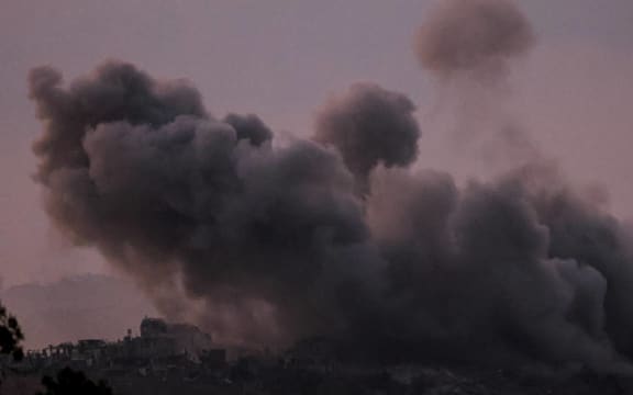Smoke billows during the Israeli military bombardment of the northern Gaza Strip on November 14, 2023, amid the ongoing battles between Israel and the Palestinian group Hamas. More than 11,000 people have been killed in relentless Israeli bombardment of the Gaza Strip, according to the Hamas-run health ministry, since the war erupted after Palestinian militants raided southern Israel on October 7 killing at least 1200 people, according to official Israeli figures (Photo by Jack Guez / AFP)